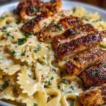Cheesy Garlic Cajun Chicken Bowtie Pasta in Alfredo Sauce