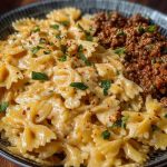Cheesy Bowtie Pasta with Savory Cajun Ground Beef in Garlic Cream