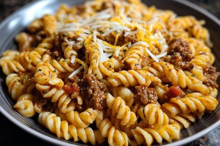 Cheesy Garlic Twisted Pasta with Cajun Ground Beef and Alfredo Velveeta