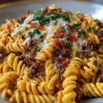 Creamy Mozzarella Rotini with Spicy Cajun Beef and Velveeta Sauce