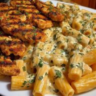 Spicy Cajun Chicken Rigatoni in Creamy Mozzarella Alfredo