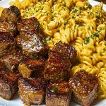 Garlic Butter Steak Bites with Spicy Cajun Alfredo Twisted Pasta
