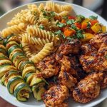 Garlic Chili Oil Chicken Bites & Cajun Alfredo with Charred Zucchini Twists
